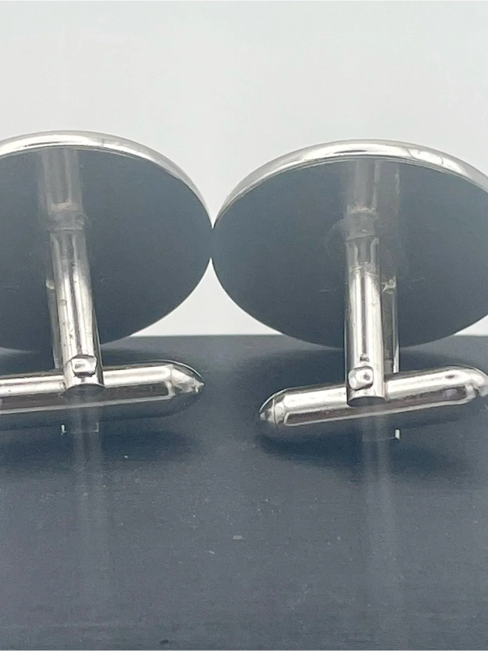 Silver Round Cufflinks with Triangle Emblem Inlaid with Crystal Detail
